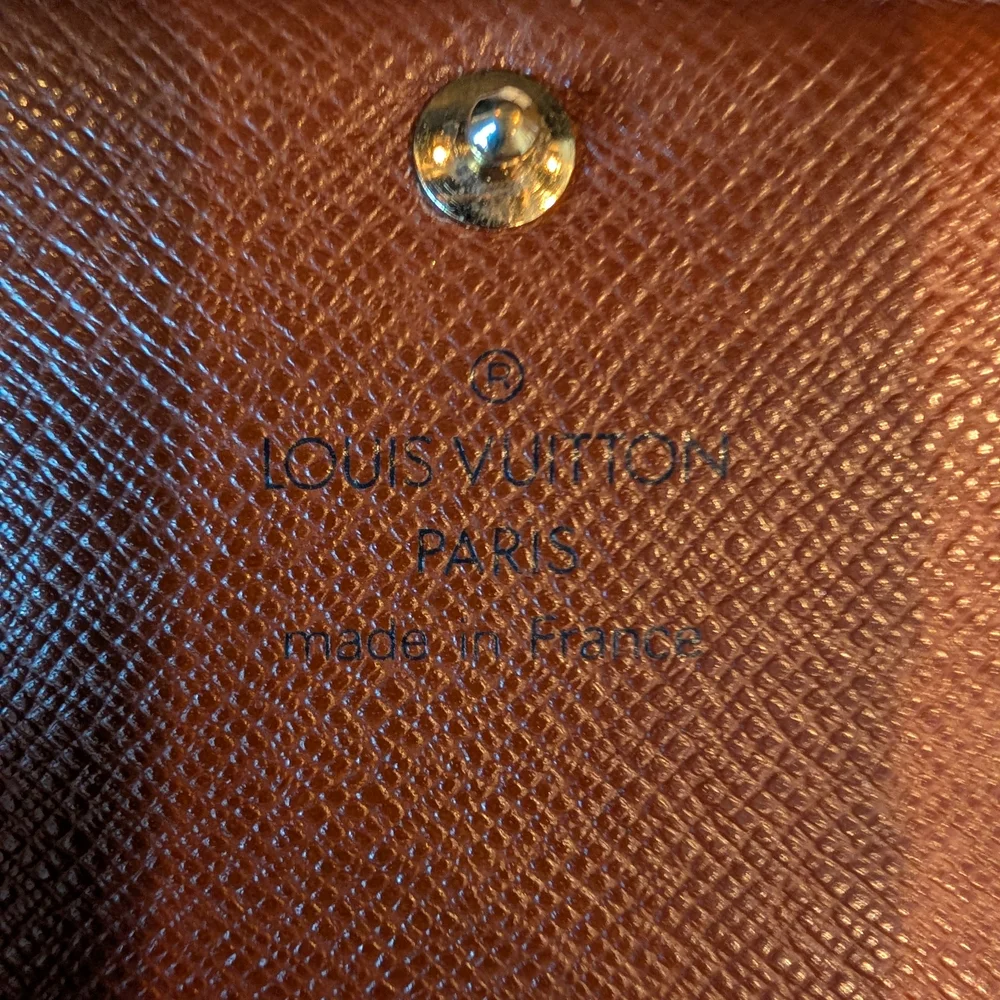 Louis Vuitton Porte Monnaie Tressor Trifold Zippy Wallet